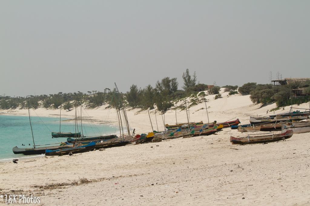 outrigger canoes on shore at edge of Nosy Ve-Androka National P…