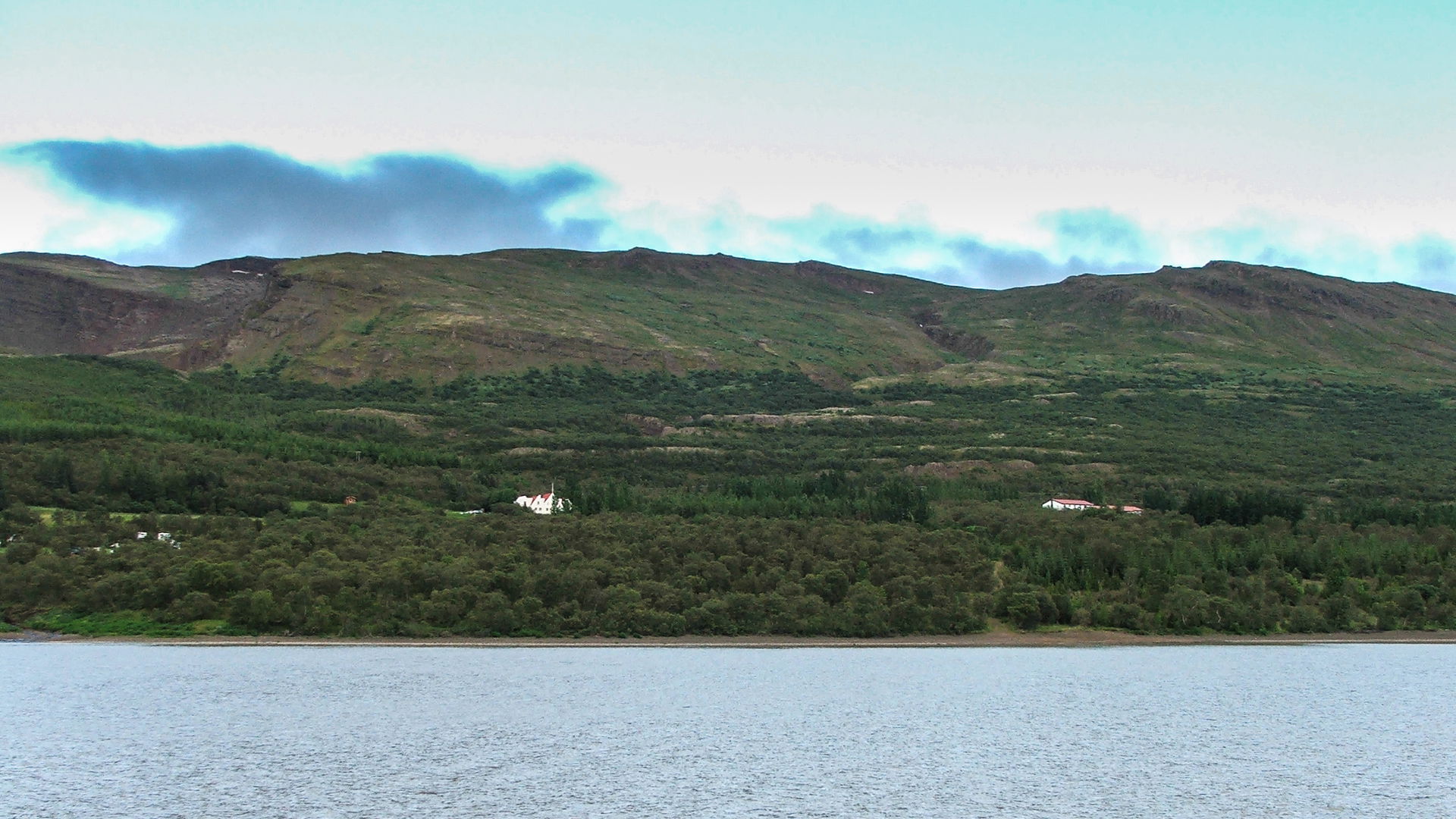 Hallormsstaður seen from lake Lagarfljót.