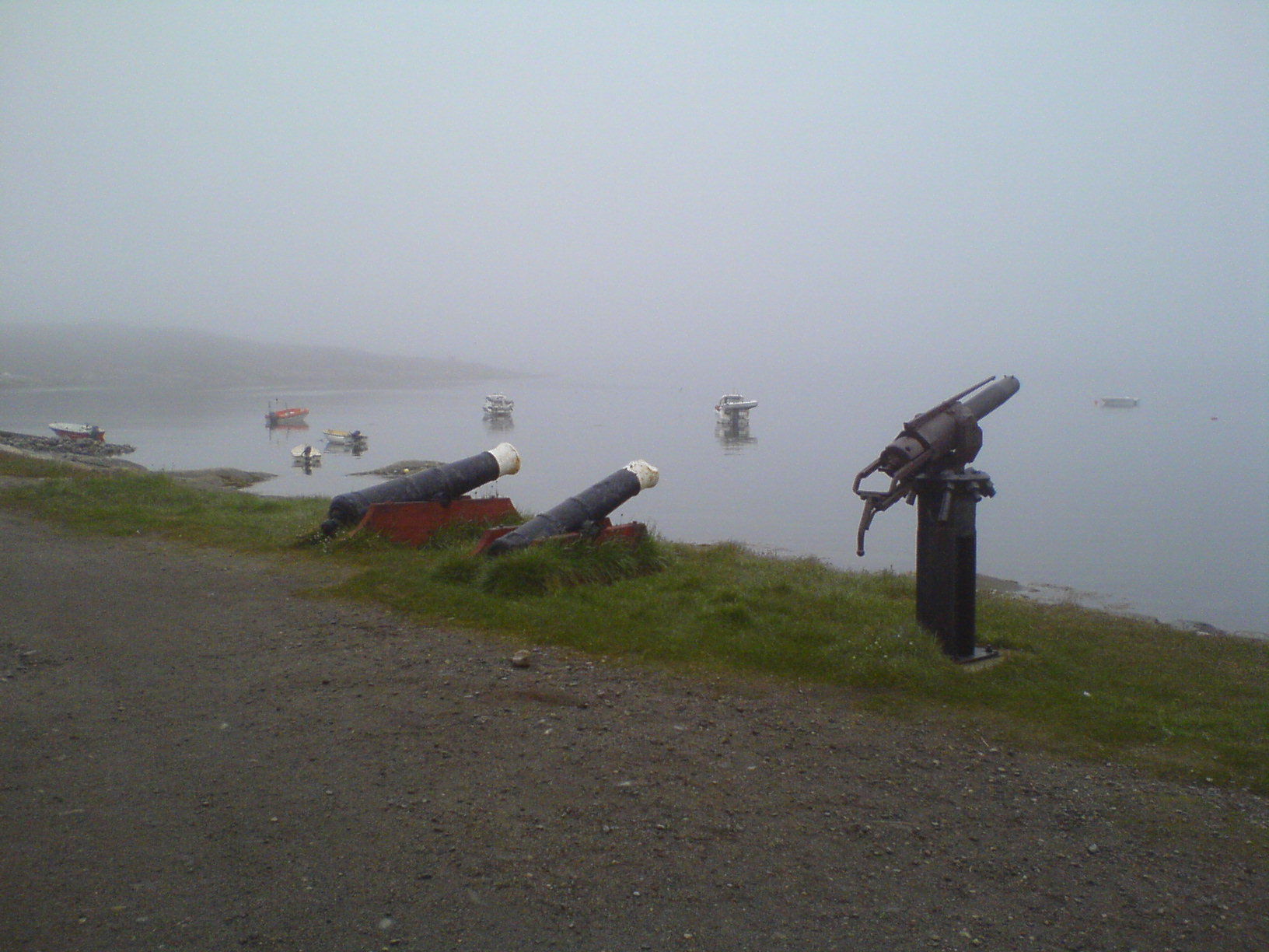 A foggy morning in Qeqertarsuaq. Some old artillery pieces over…