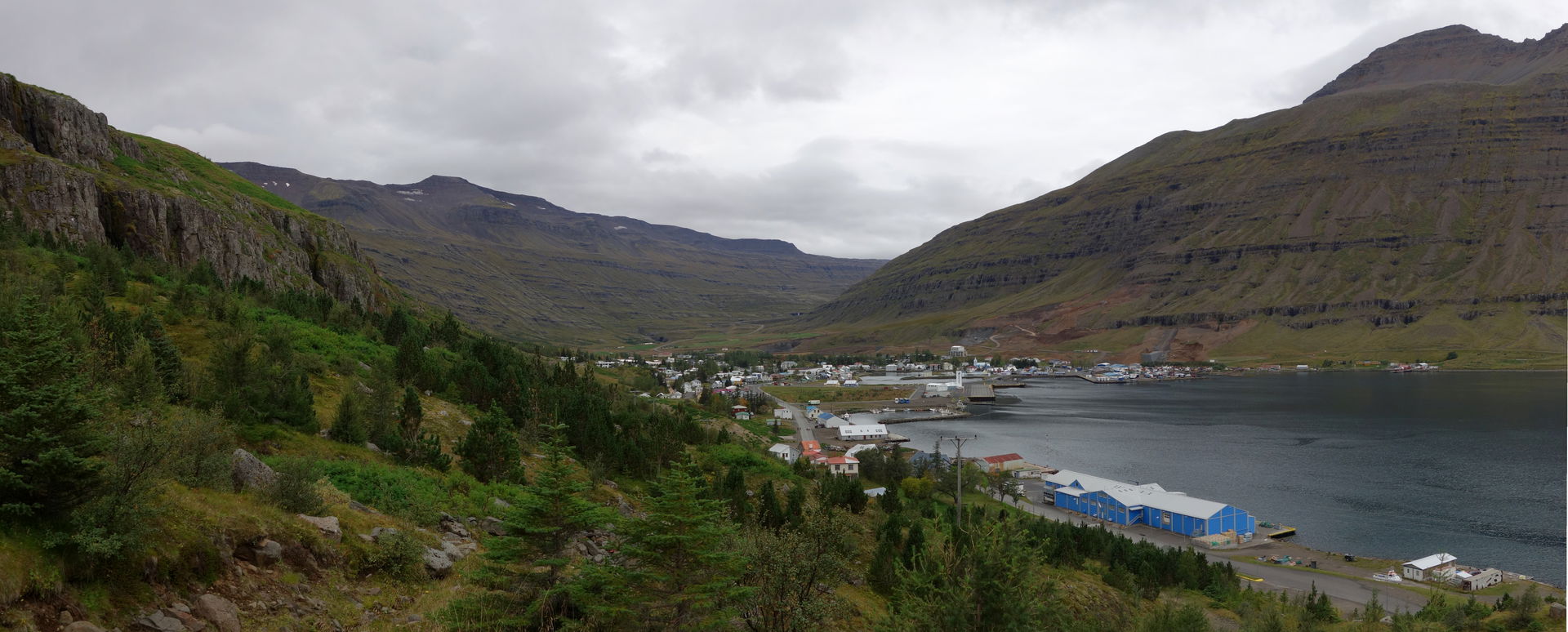 A panorama of the town of Seyðisfjörður and the fjord of the sa…