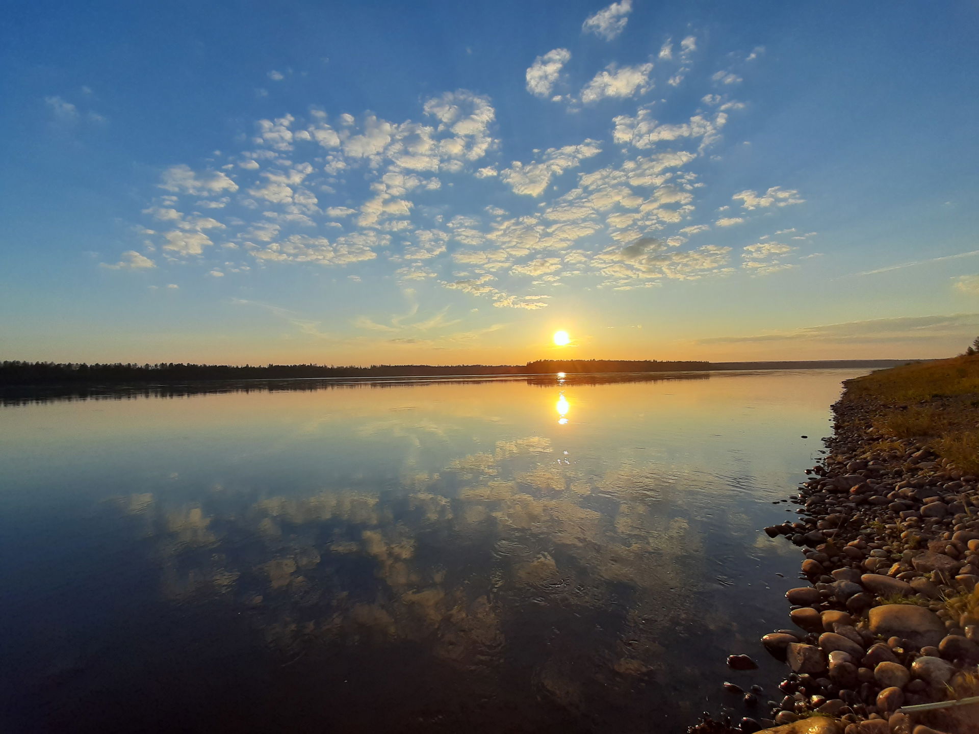 July sunset. Aldan river.
