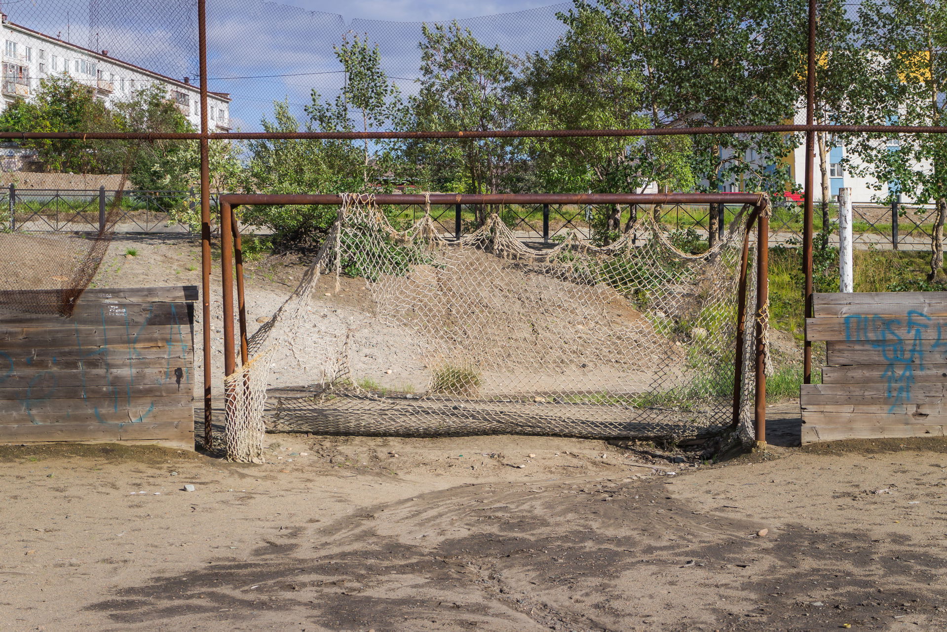 Goal in old football venue in Nikel urban locality, Murmansk Ob…
