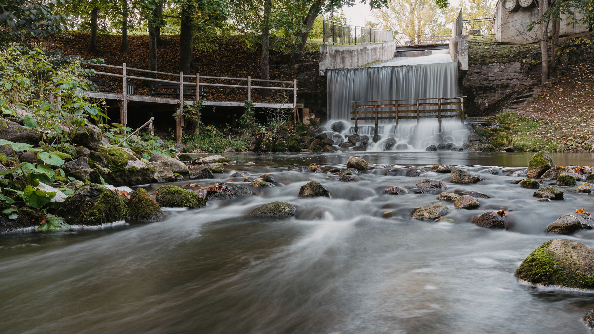 Waterfall or water cascade in Smiltene, Lake Teperis
