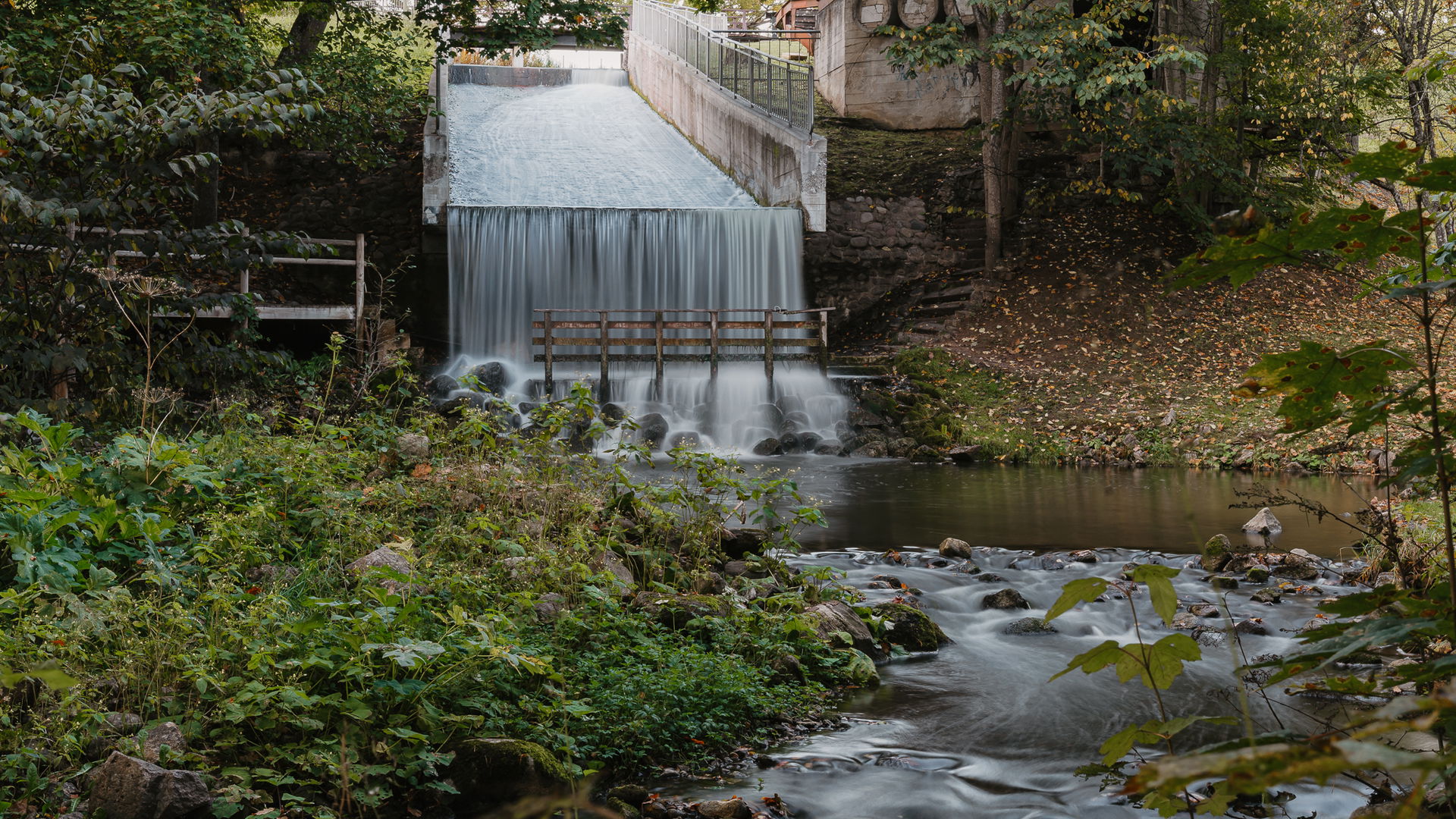Waterfall or water cascade in Smiltene, Lake Teperis