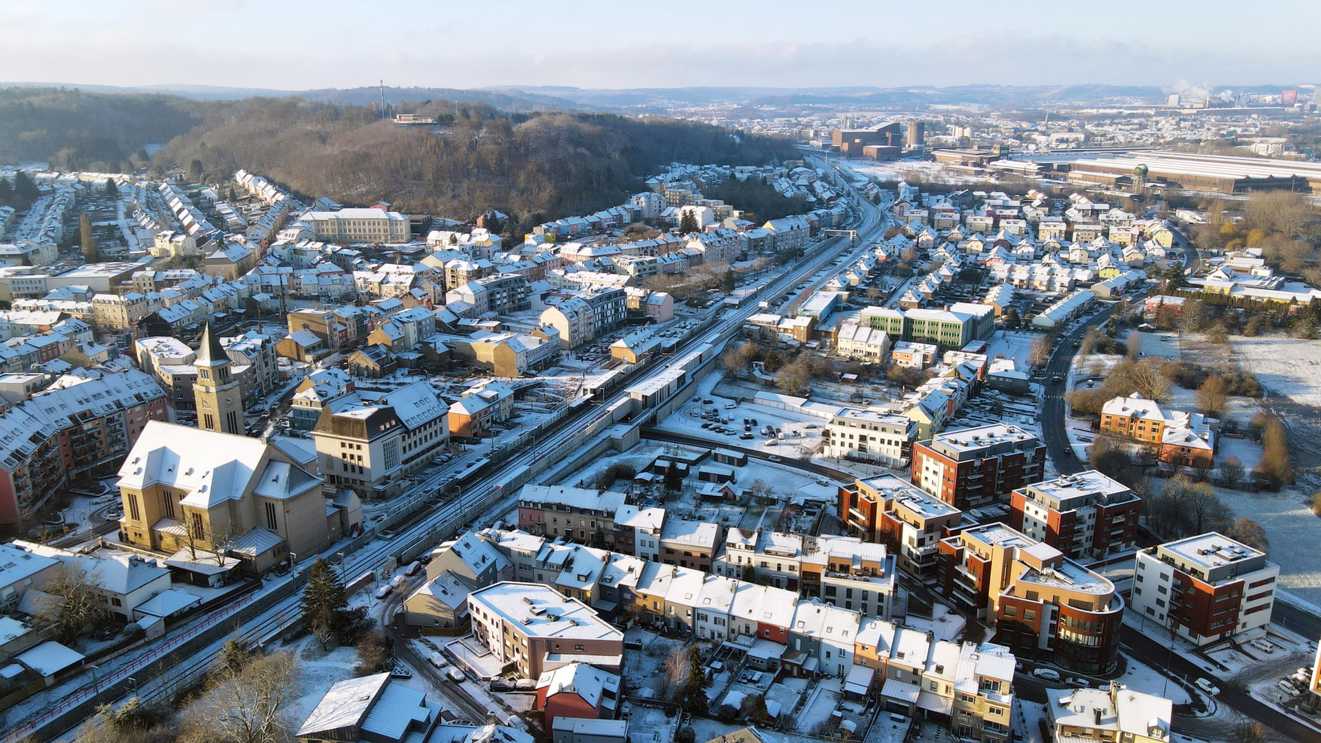 Photograph of the center of the town of Schifflange (church, tr…