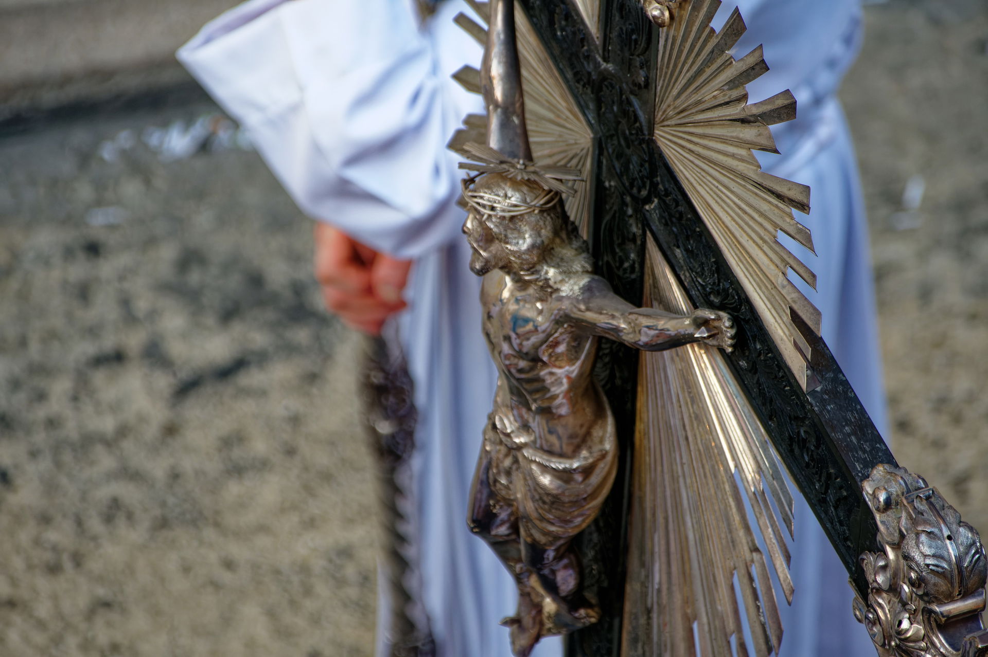 The crucifix plays a central role in many Catholic processions,…