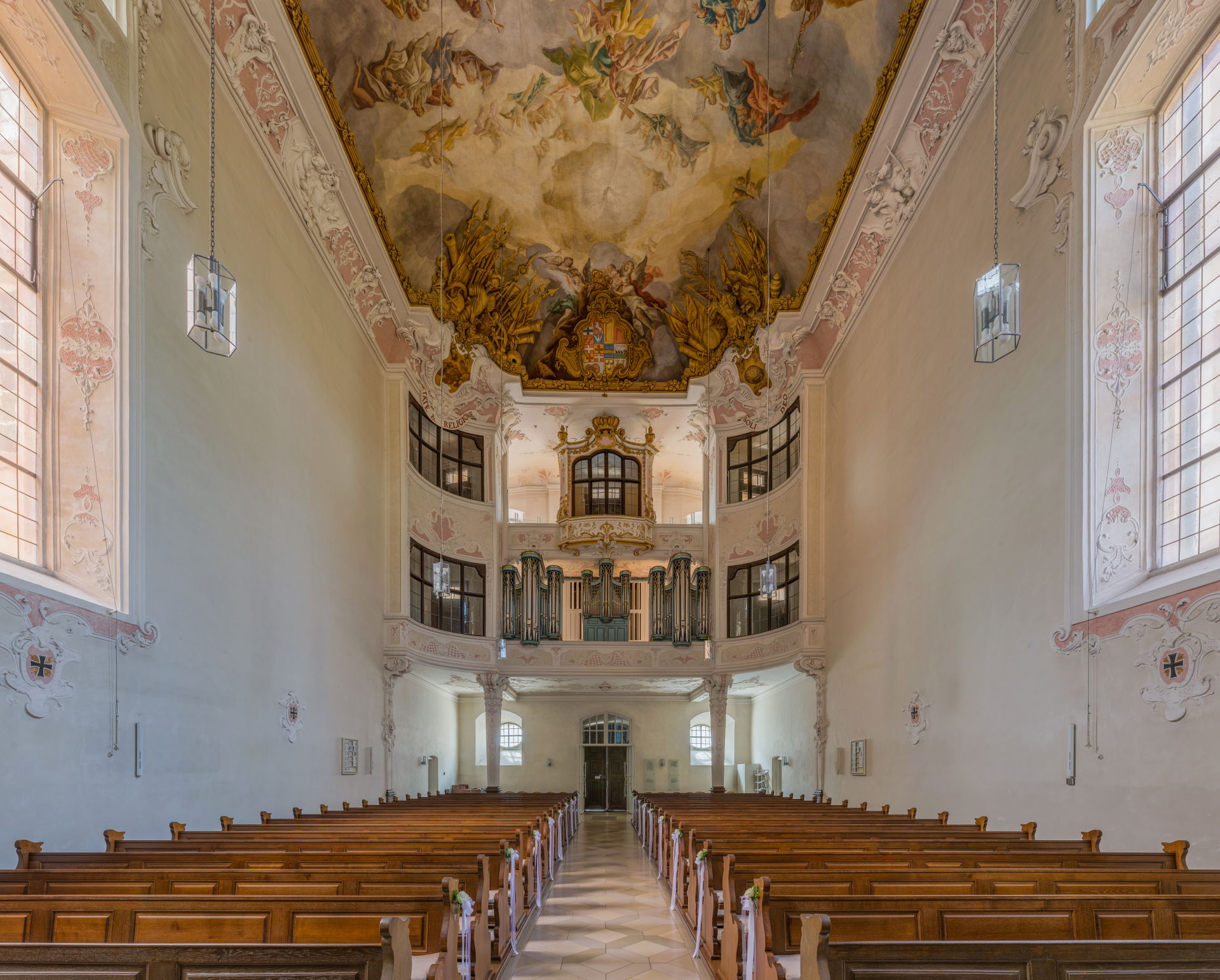 An interior view of Schlosskirche, Bad Mergentheim, Nave, looki…