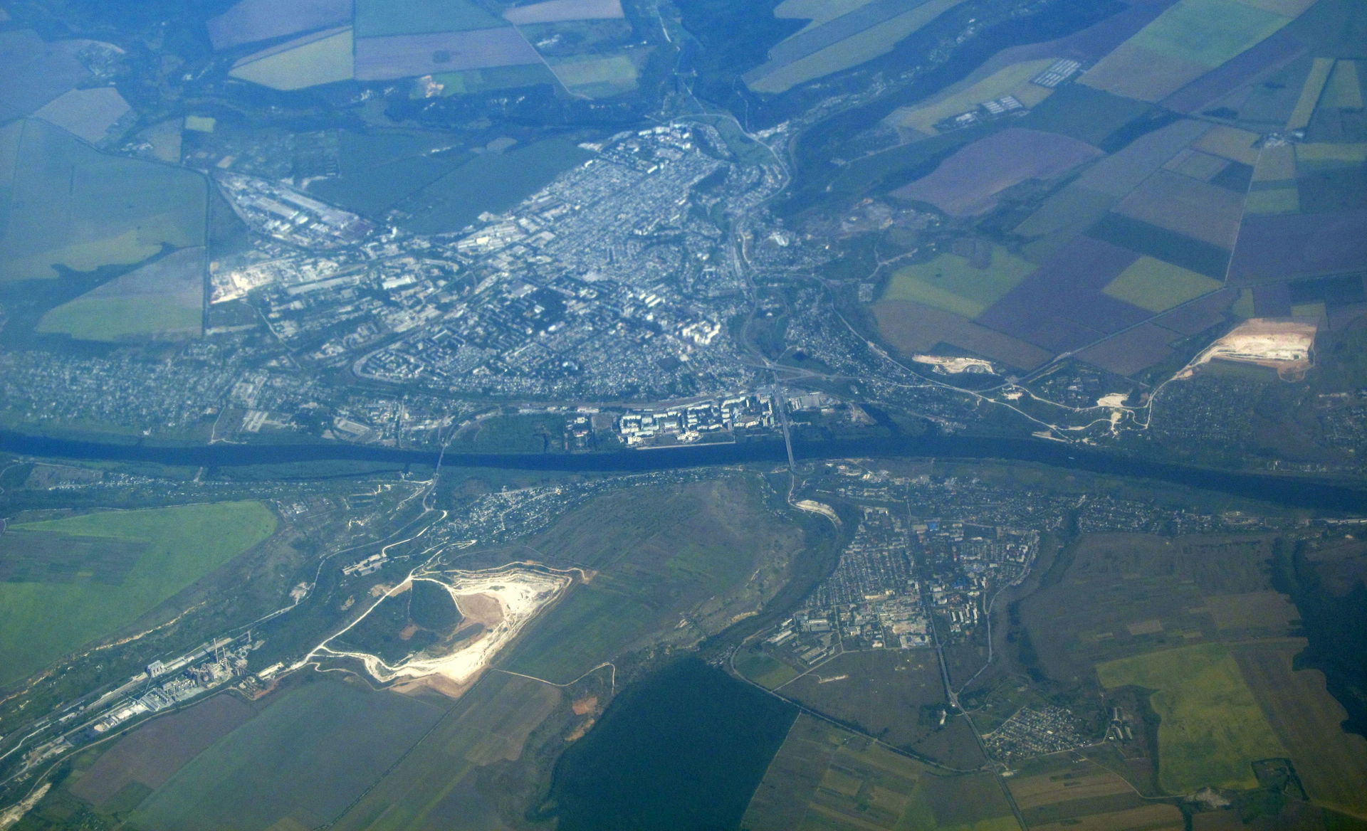 Aerial view of Rîbnița (top), Rezina (bottom right), and Ciorna…