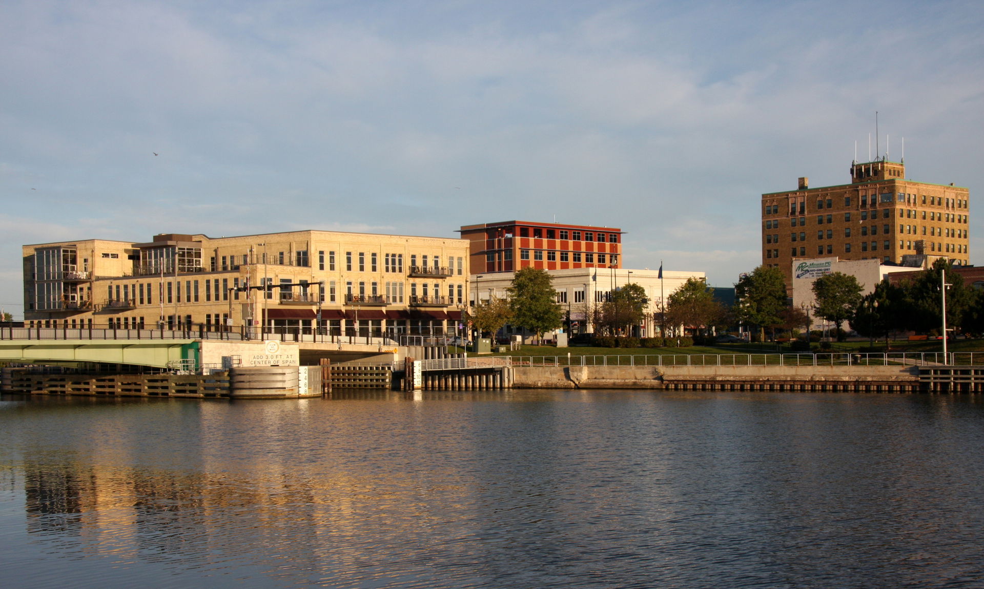 Manitowoc River, near where it enters Lake Michigan, reflecting…