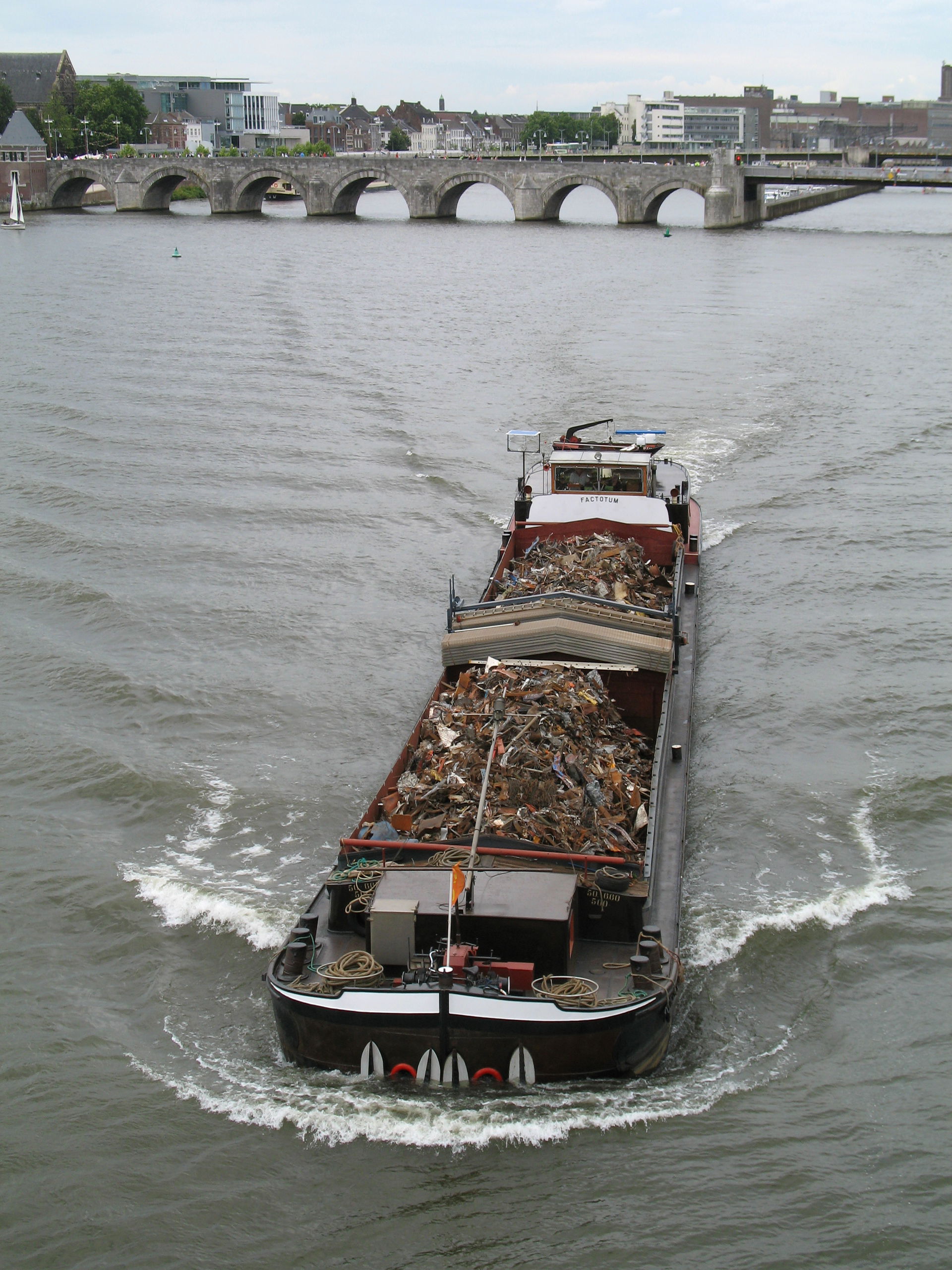 The Dutch barge Factotum transporting scrap-steel on the Meuse …