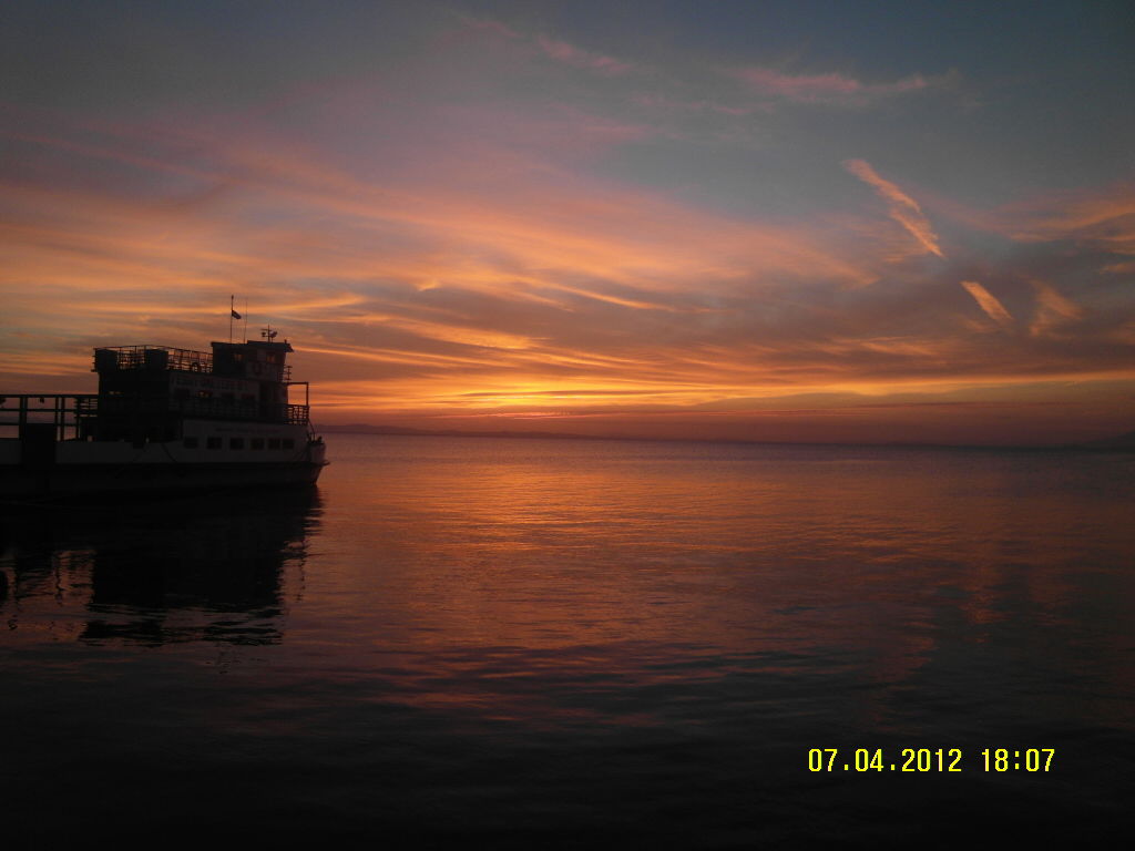 A sunset as seen from the harbor of Moyogalpa, Ometepe