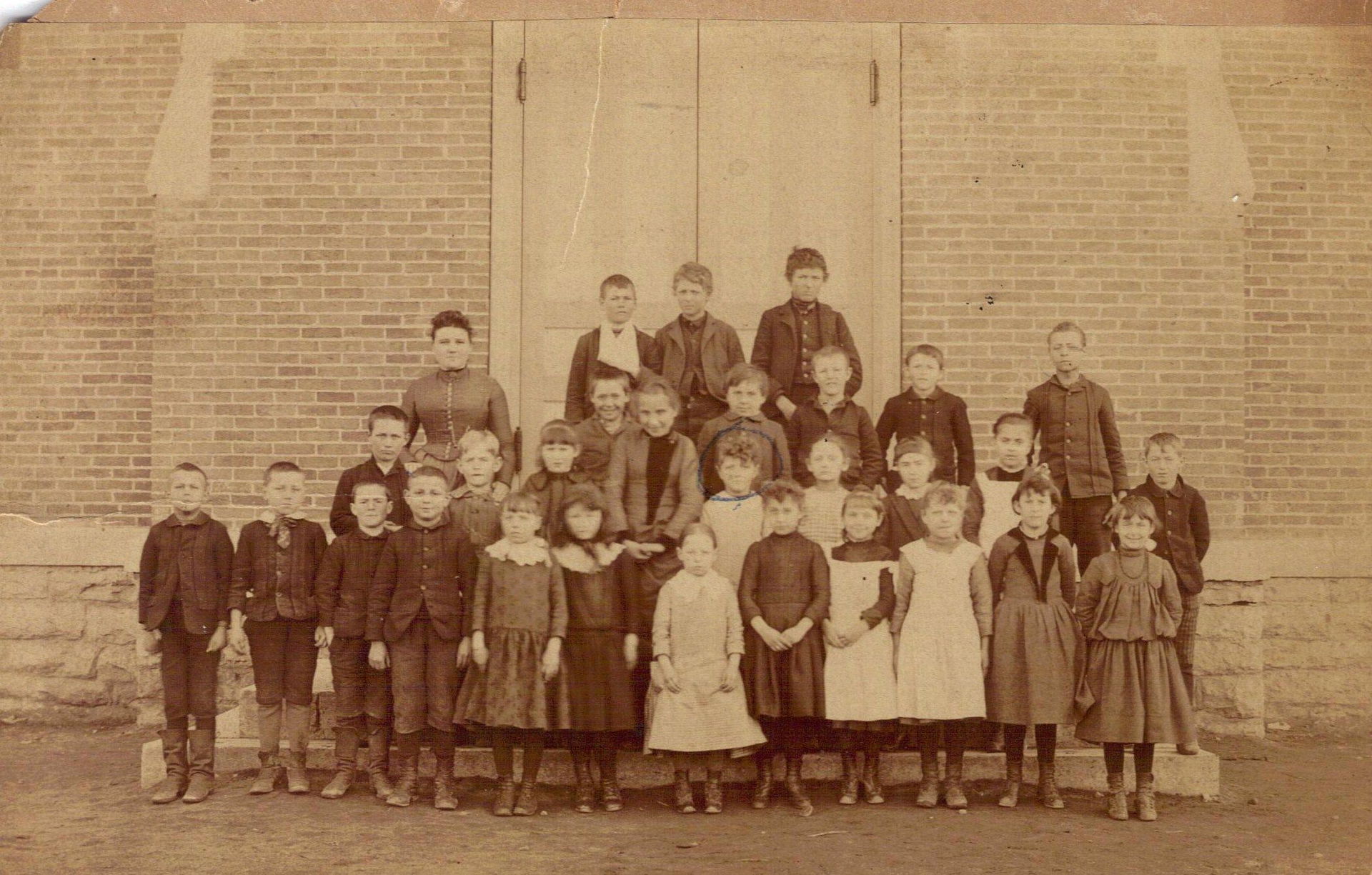 Photo taken in 1888 of the teacher and students in the "3rd roo…