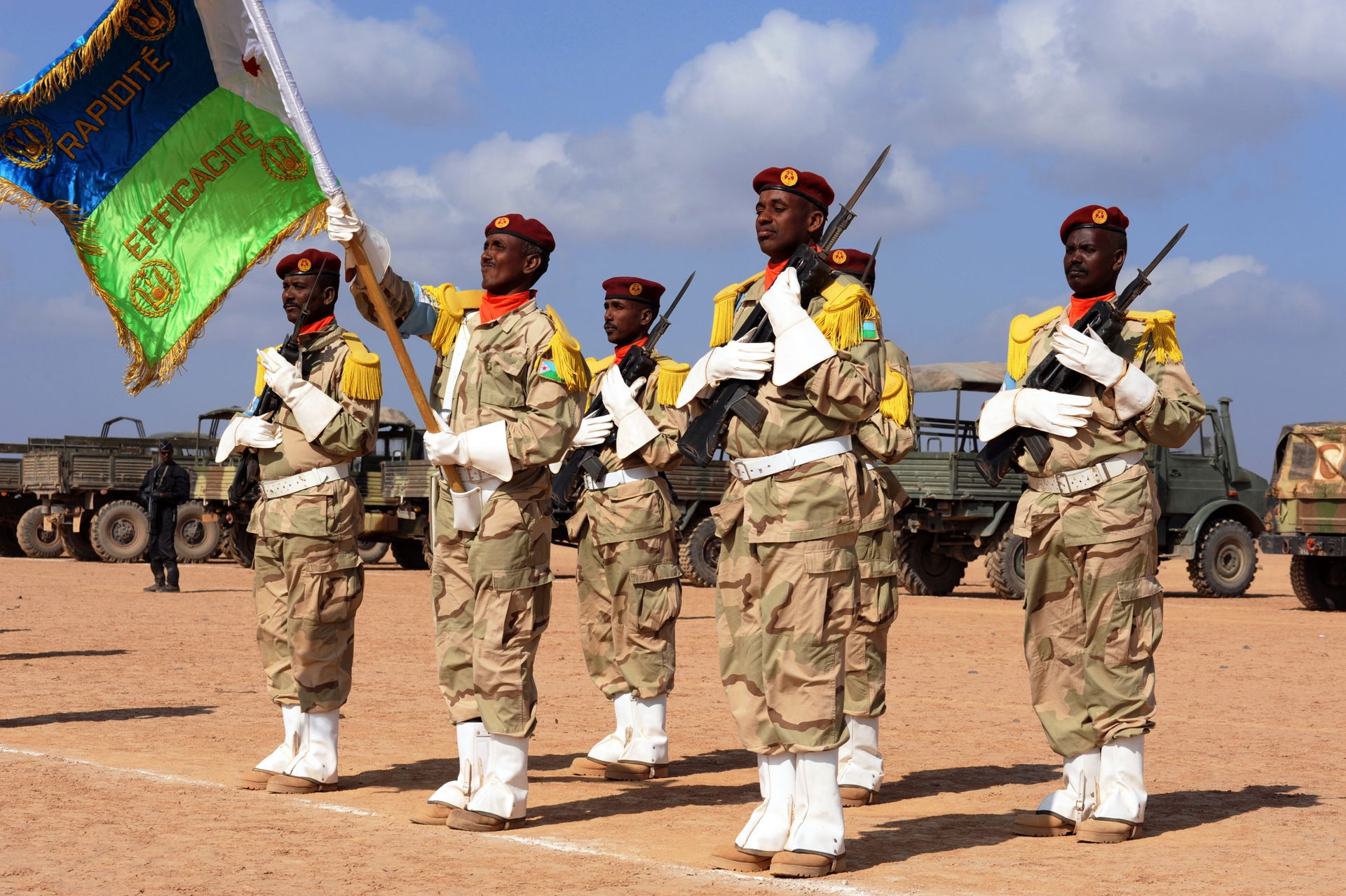 Members of the Djibouti Army stand at attention at the closing …