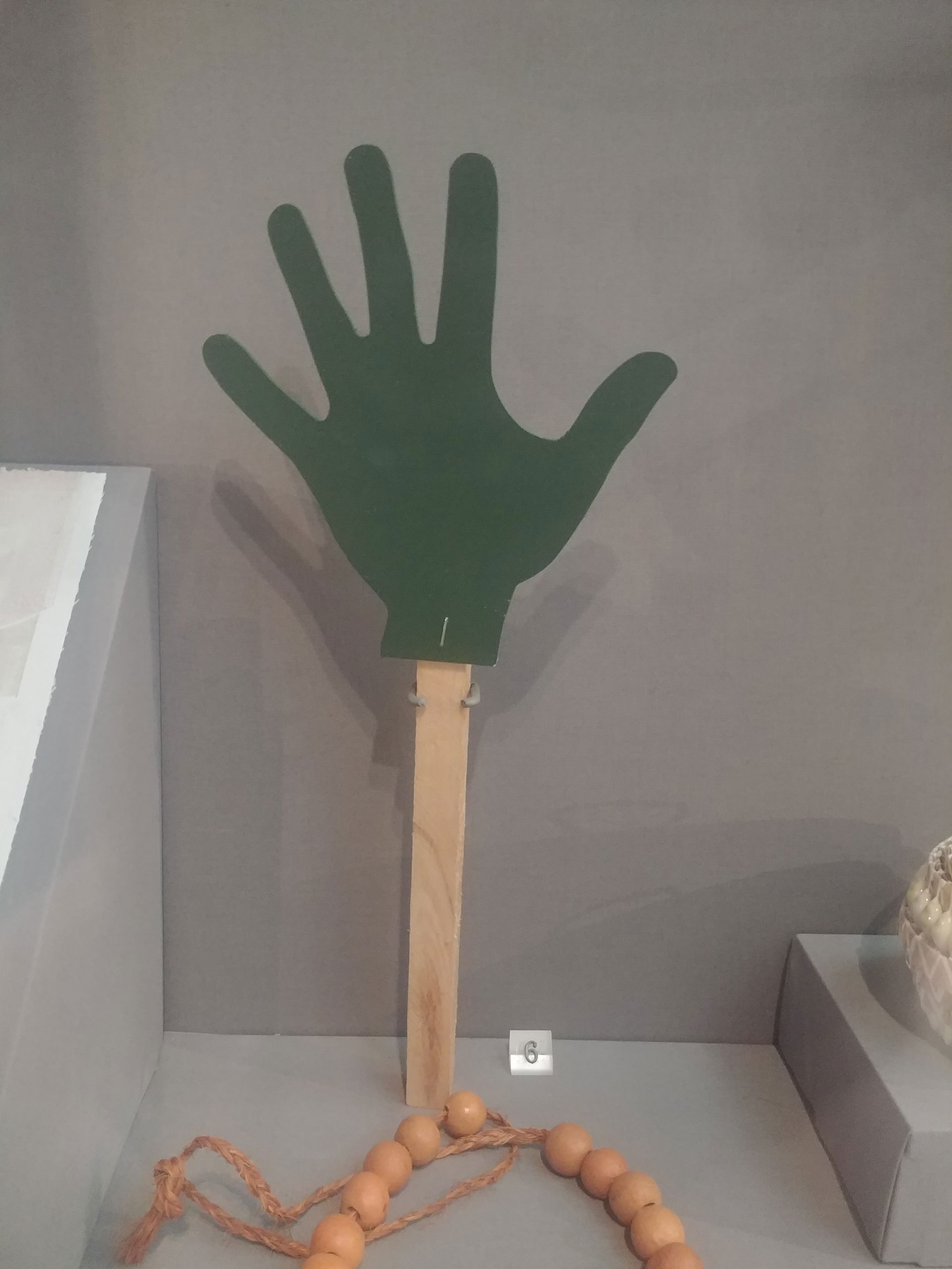 Green protest hand from Norfolk Island, collected by Lucie Carr…