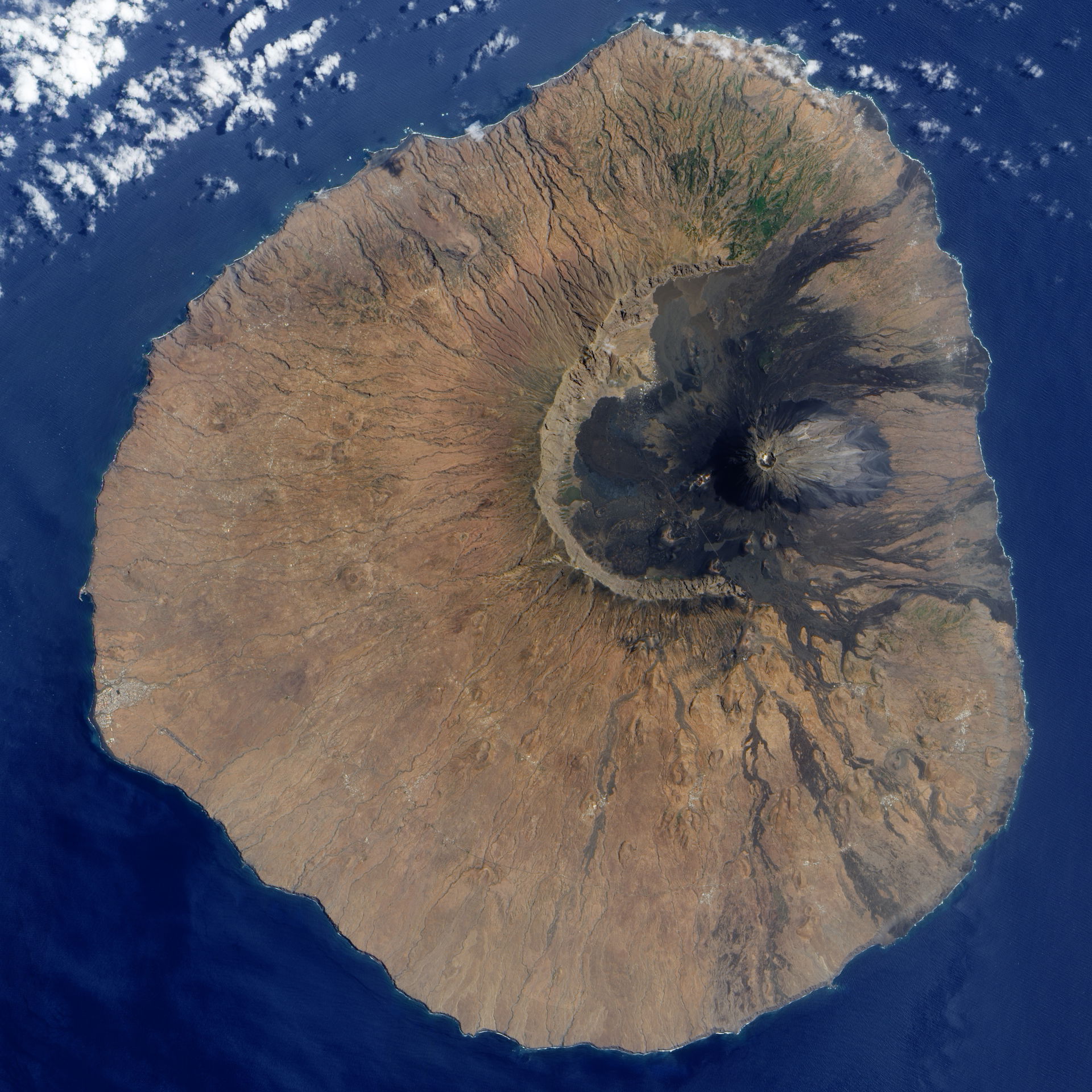 The volcano’s most distinctive feature, its nine-kilometre wide…