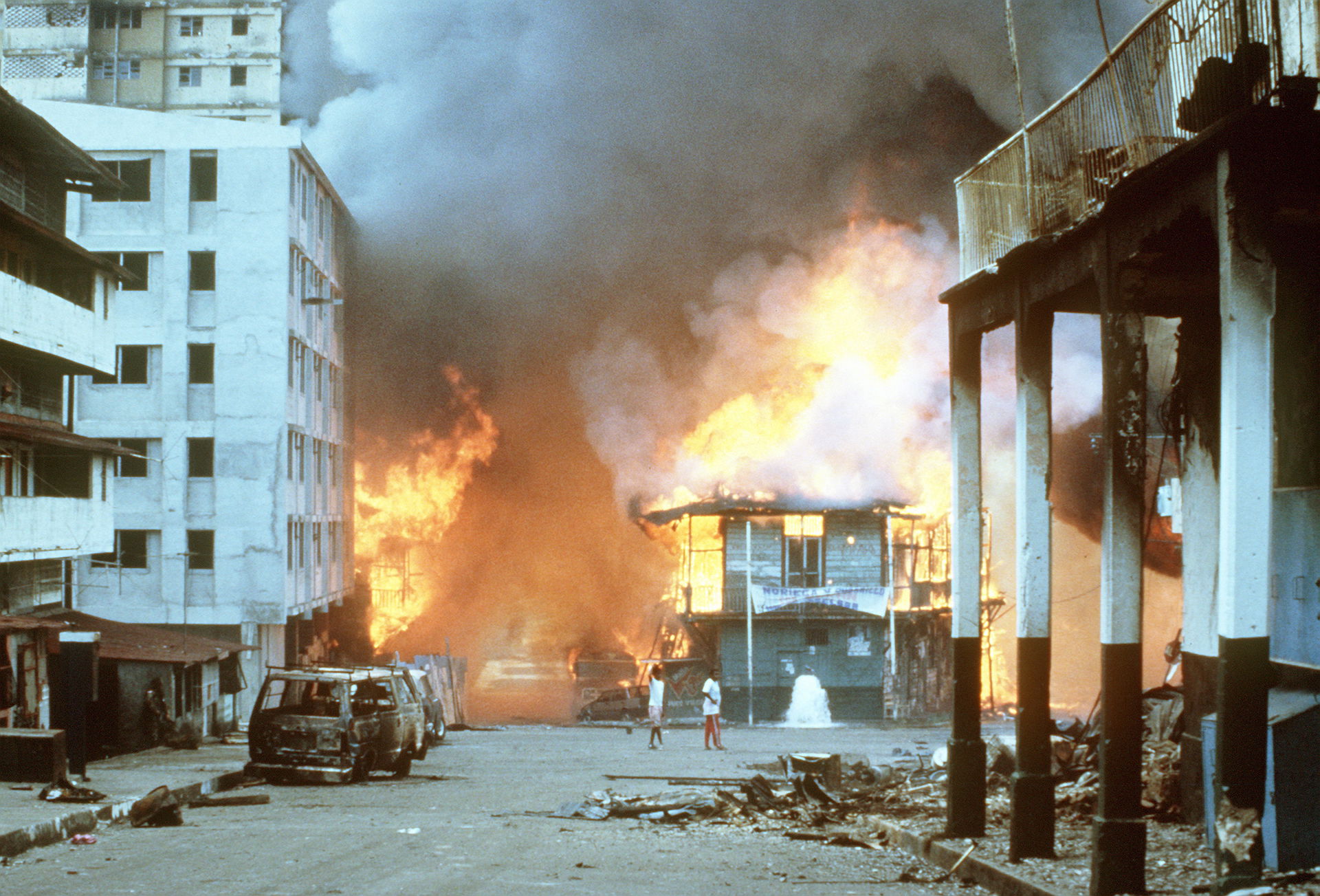 Flames engulf a building following the outbreak of hostilities …