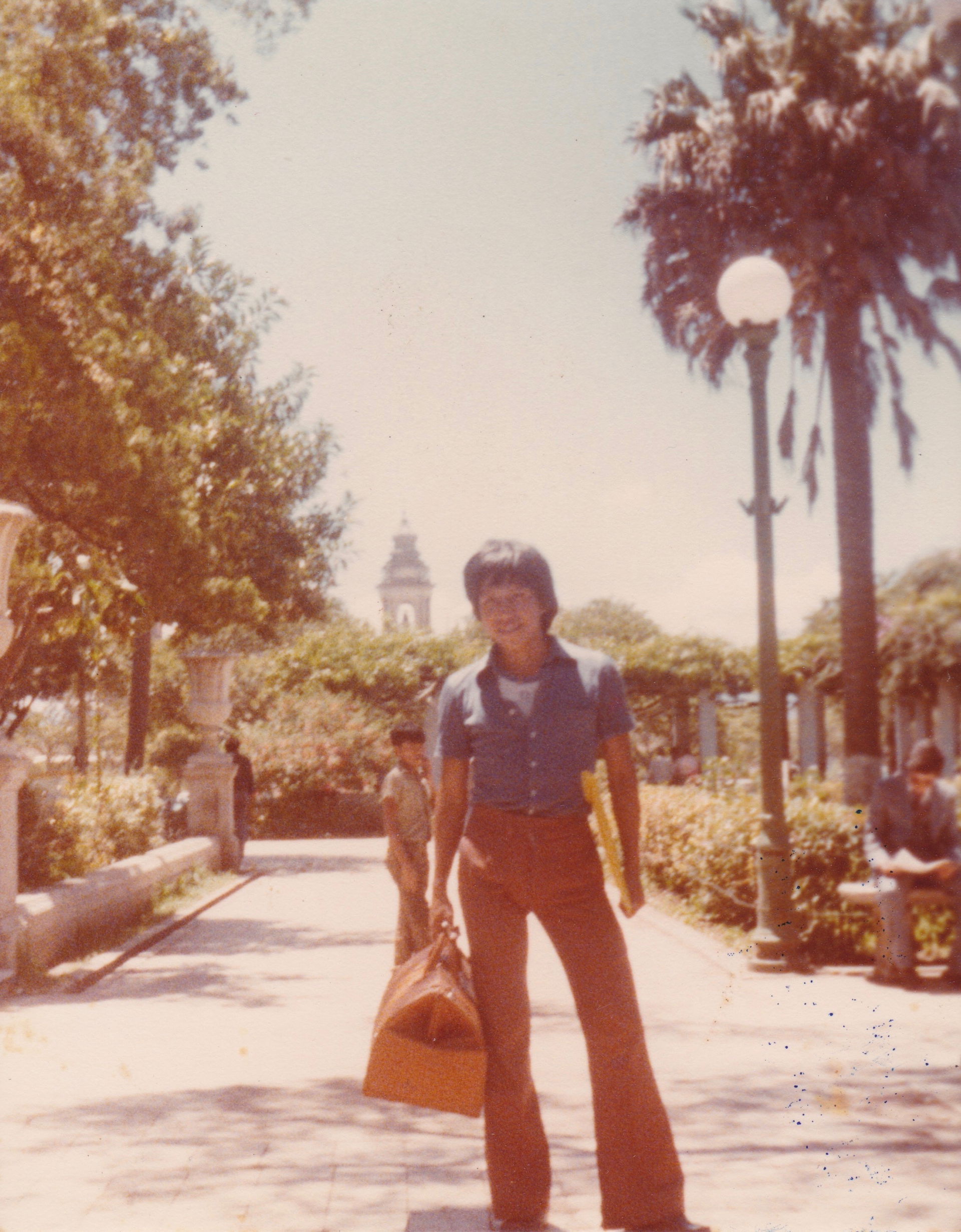 Young man in park (Parque Centenario?) Guatemala City, 1979