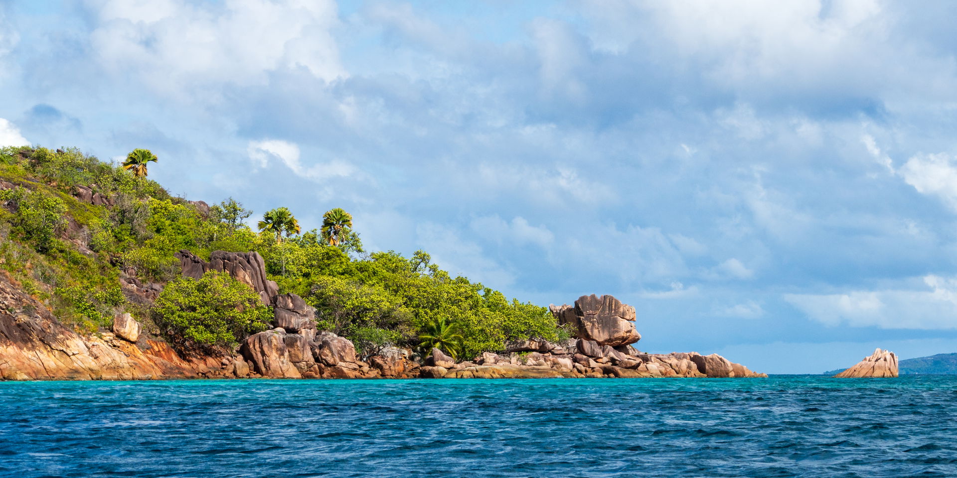 Granite rocks on the coast of Curieuse Island, Seychelles.