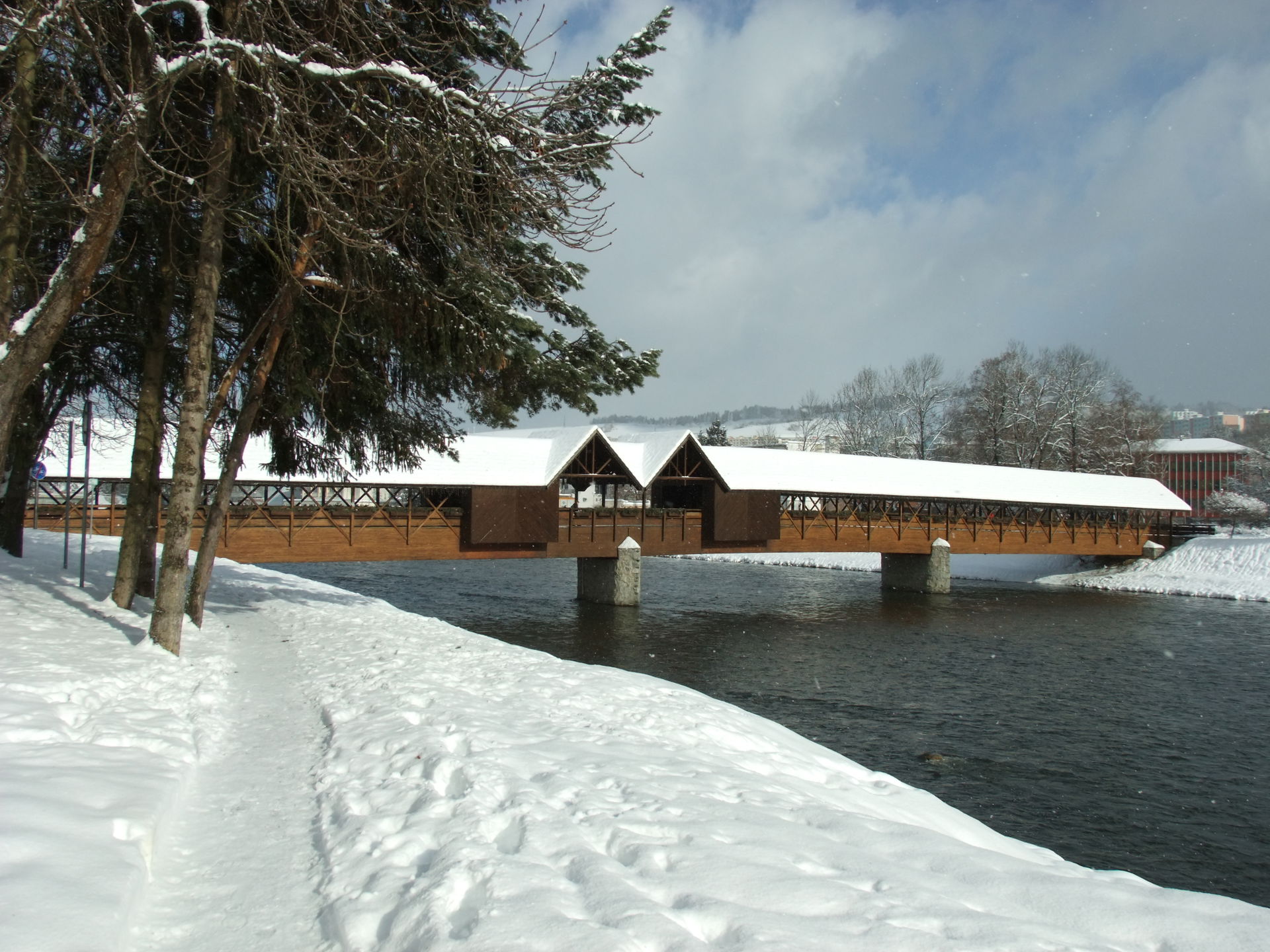 The wooden bridge over the river Orava in Dolný Kubín town, Slo…
