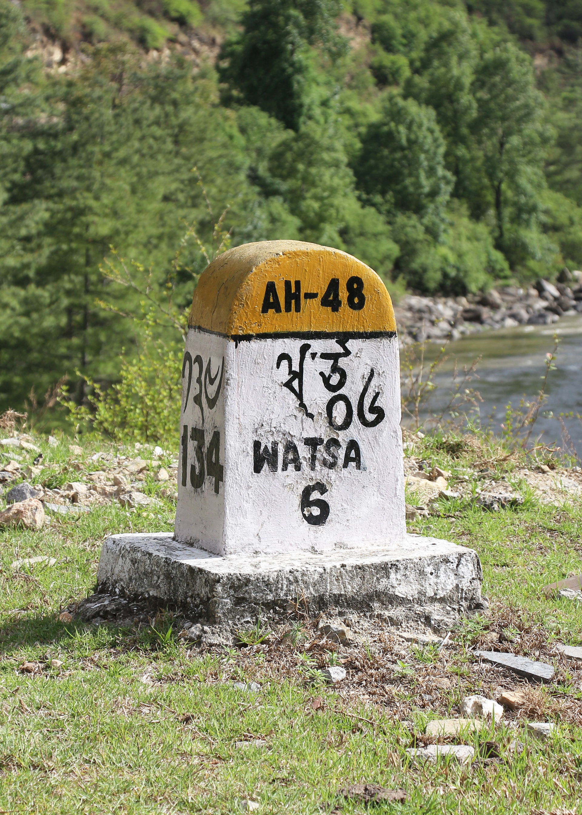 Watsa milestone on Phuentsholing-Thimphu highway (AH-48), Bhutan