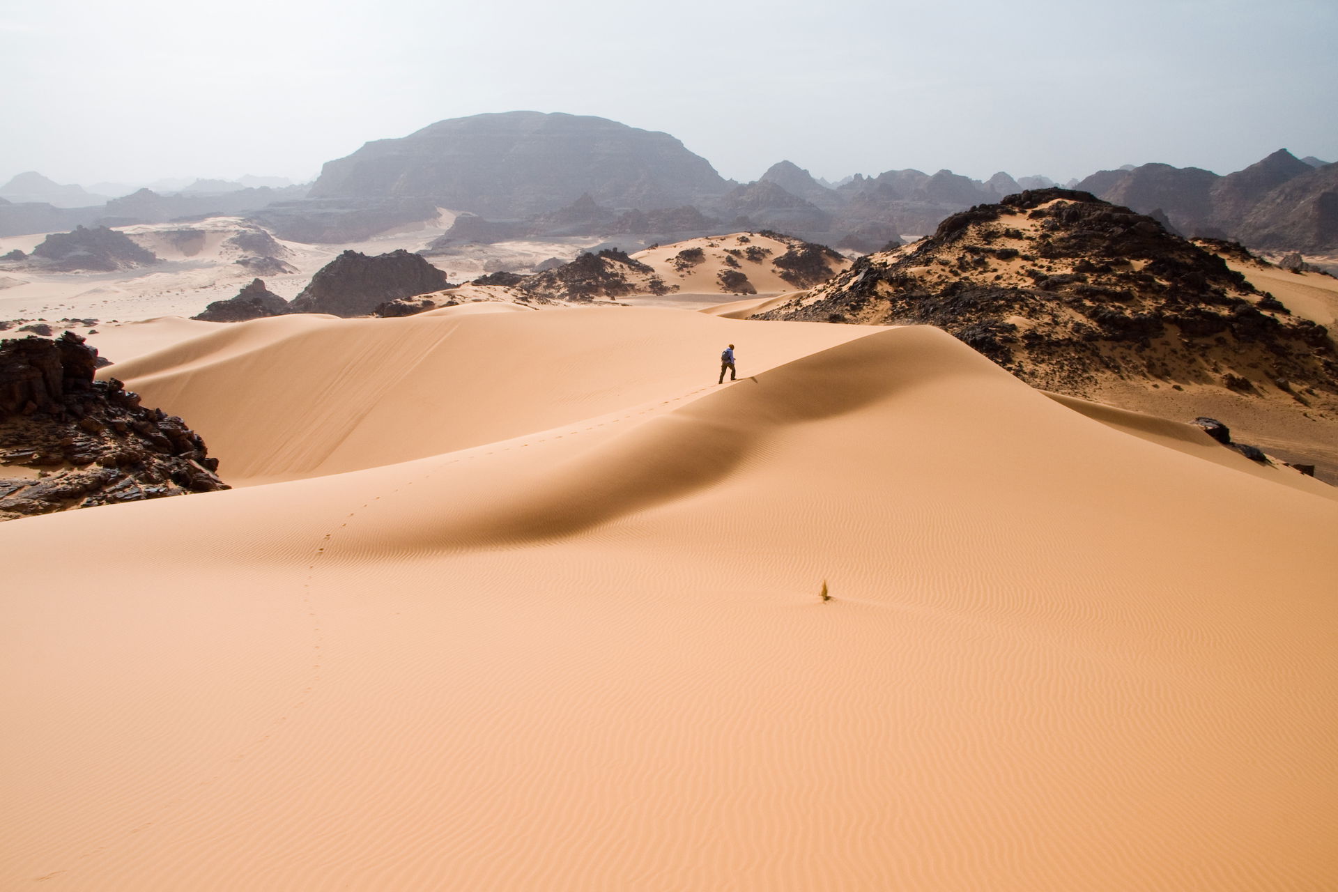 Leaving traces on soft sand dunes in Tadrart Acacus a desert ar…
