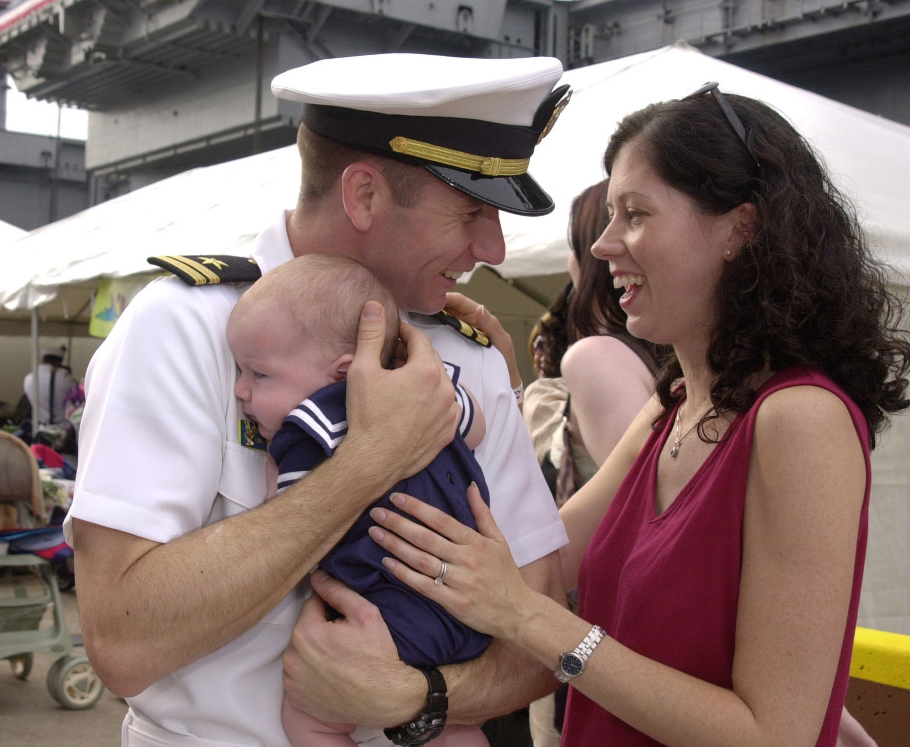Norfolk, Va. (July 31, 2005) – Lt. Brian Masterson embraces his…