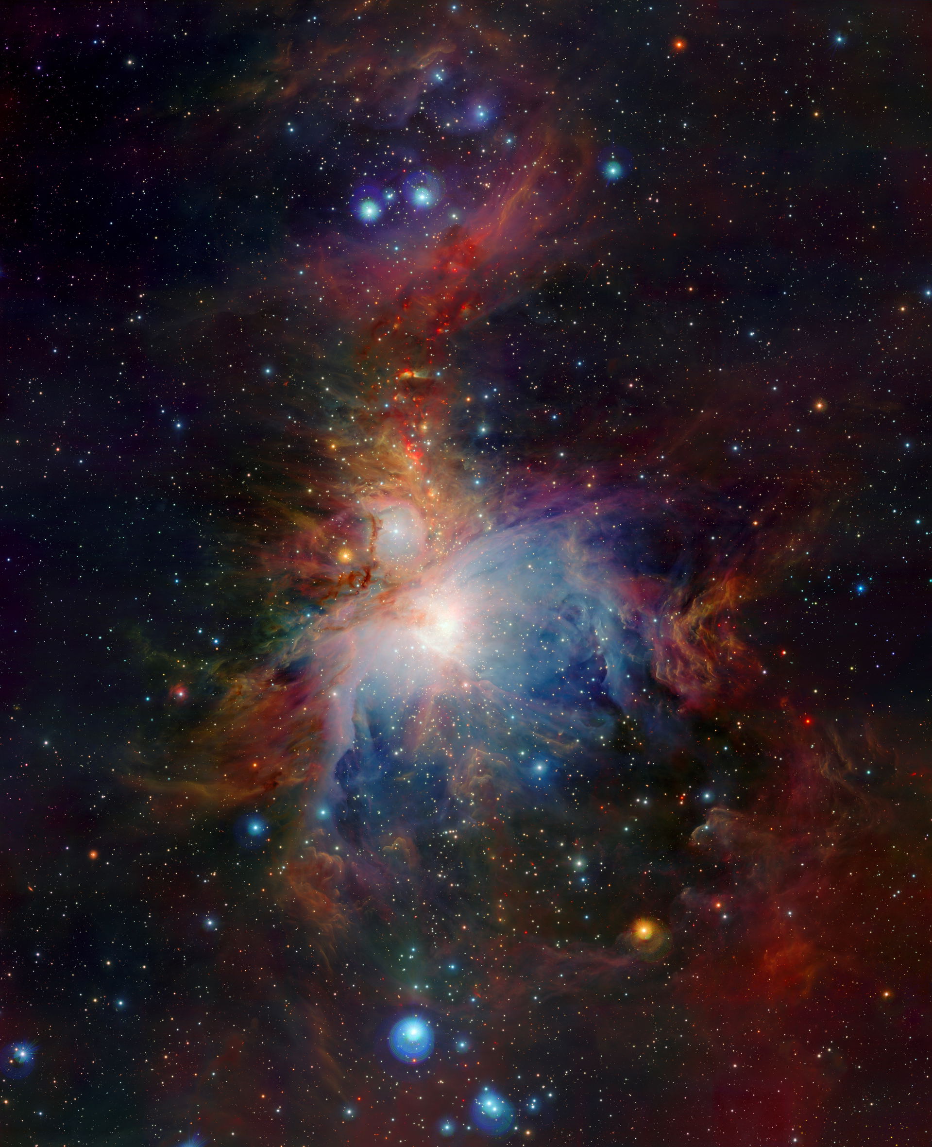 This wide-field view of the Orion Nebula (Messier 42), lying ab…