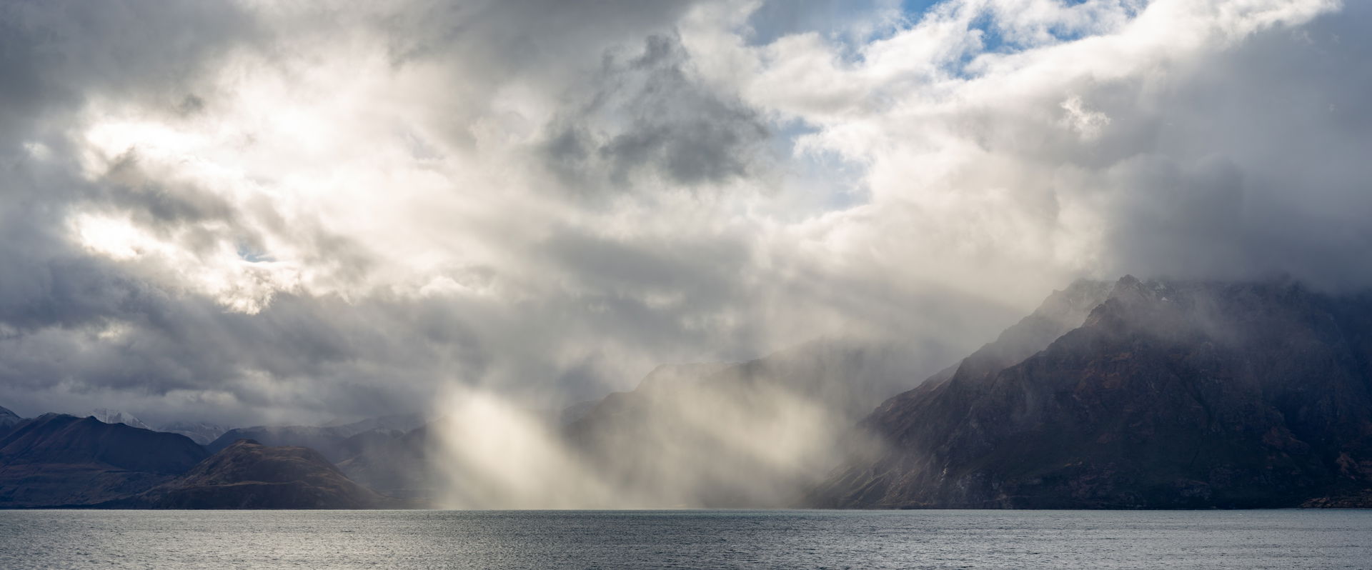 Sun over Lake Hāwea, Otago, New Zealand