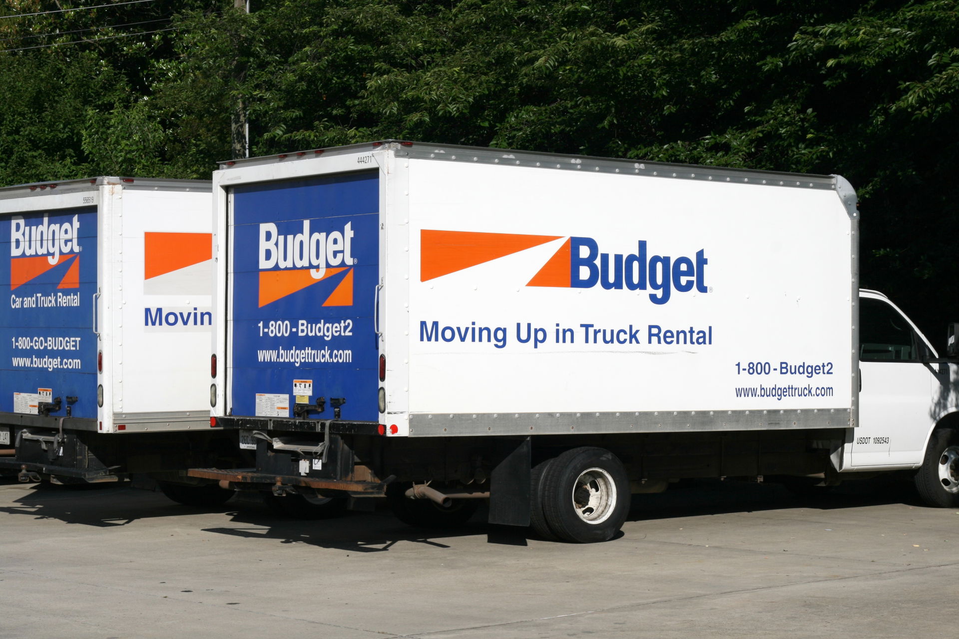 Two Budget Truck Rental box trucks parked behind Northgate Mall…