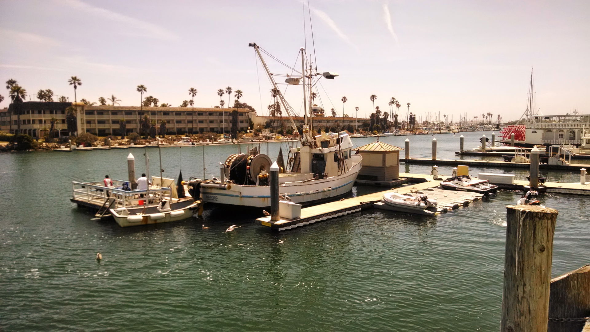 Fishing boat taken from commercial fishing boat unloading pier …