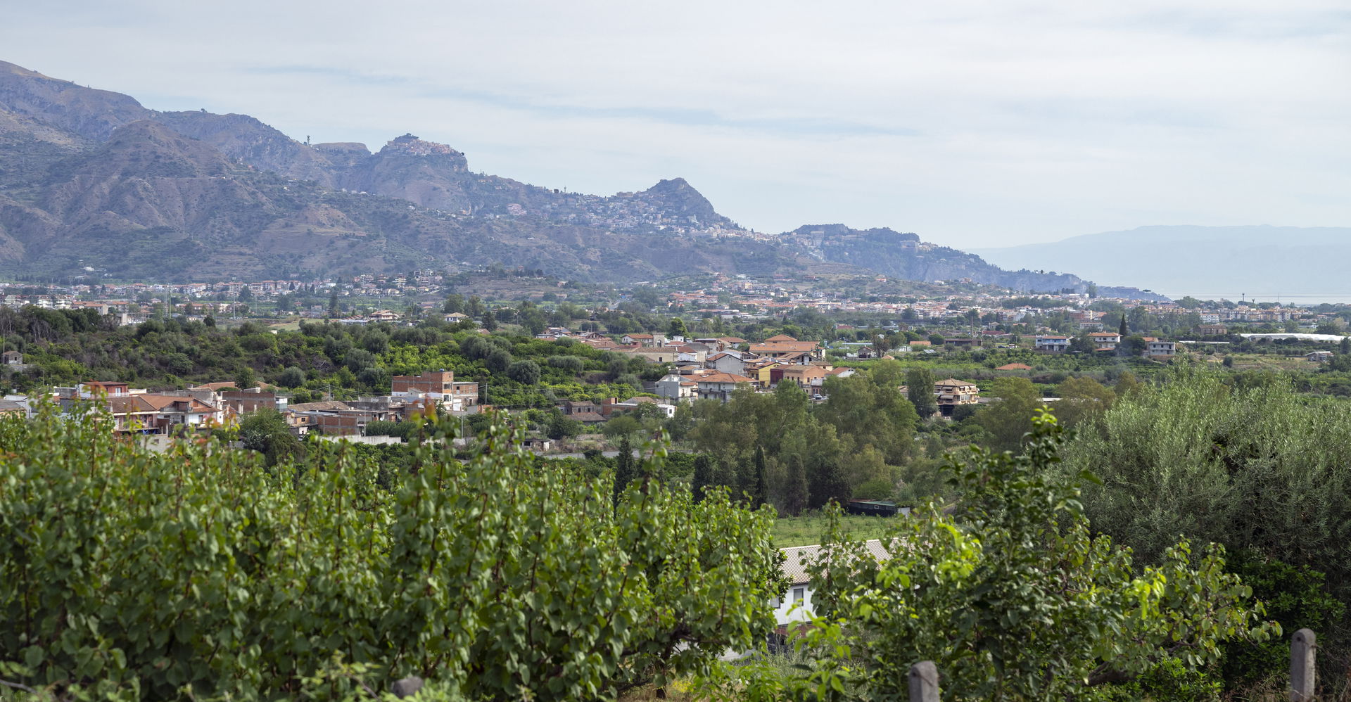 Castelmola and Taormina in Sicily seen from the southwest.