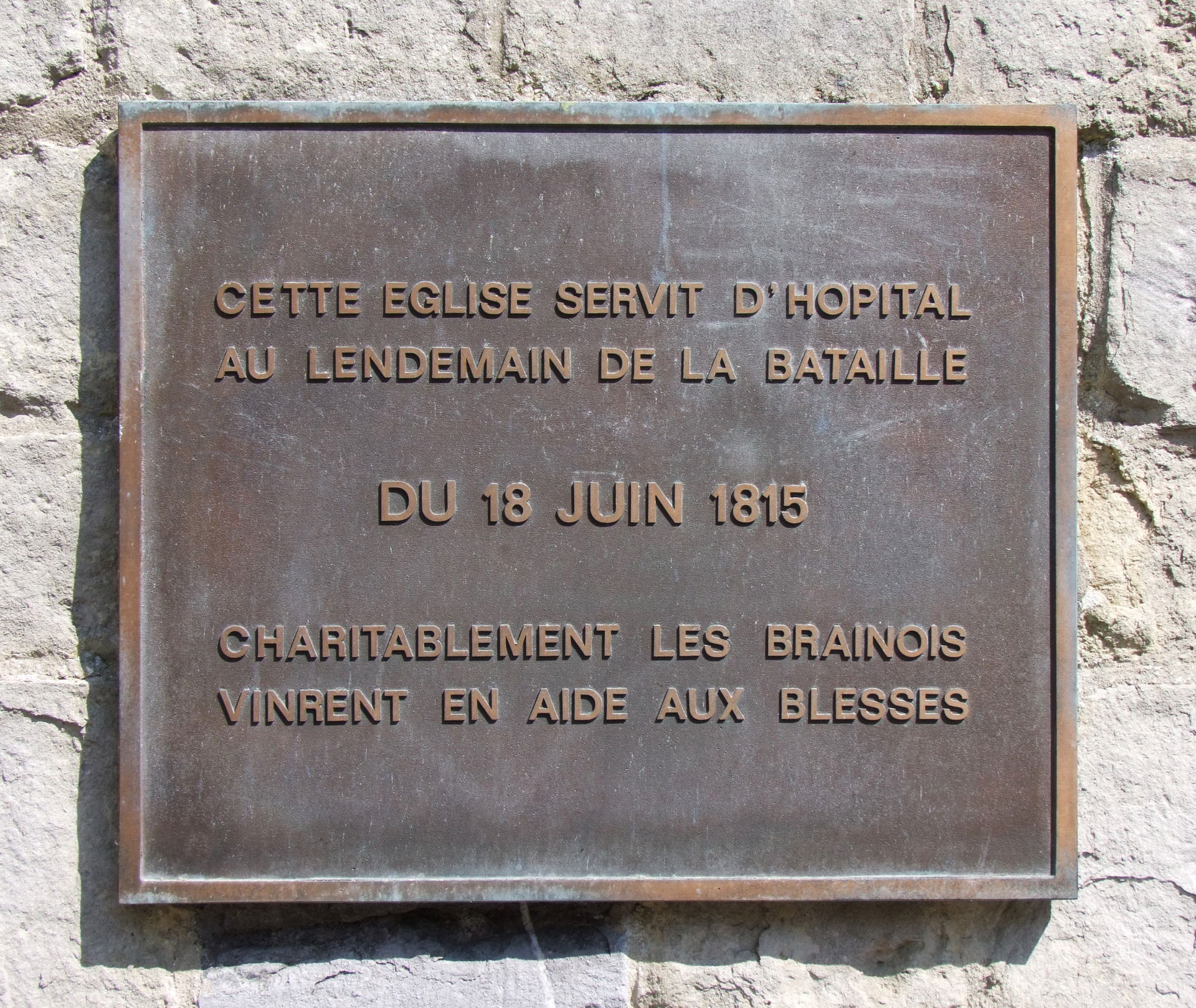 Plaque affixed at the entrance of the parish church of Braine-l…
