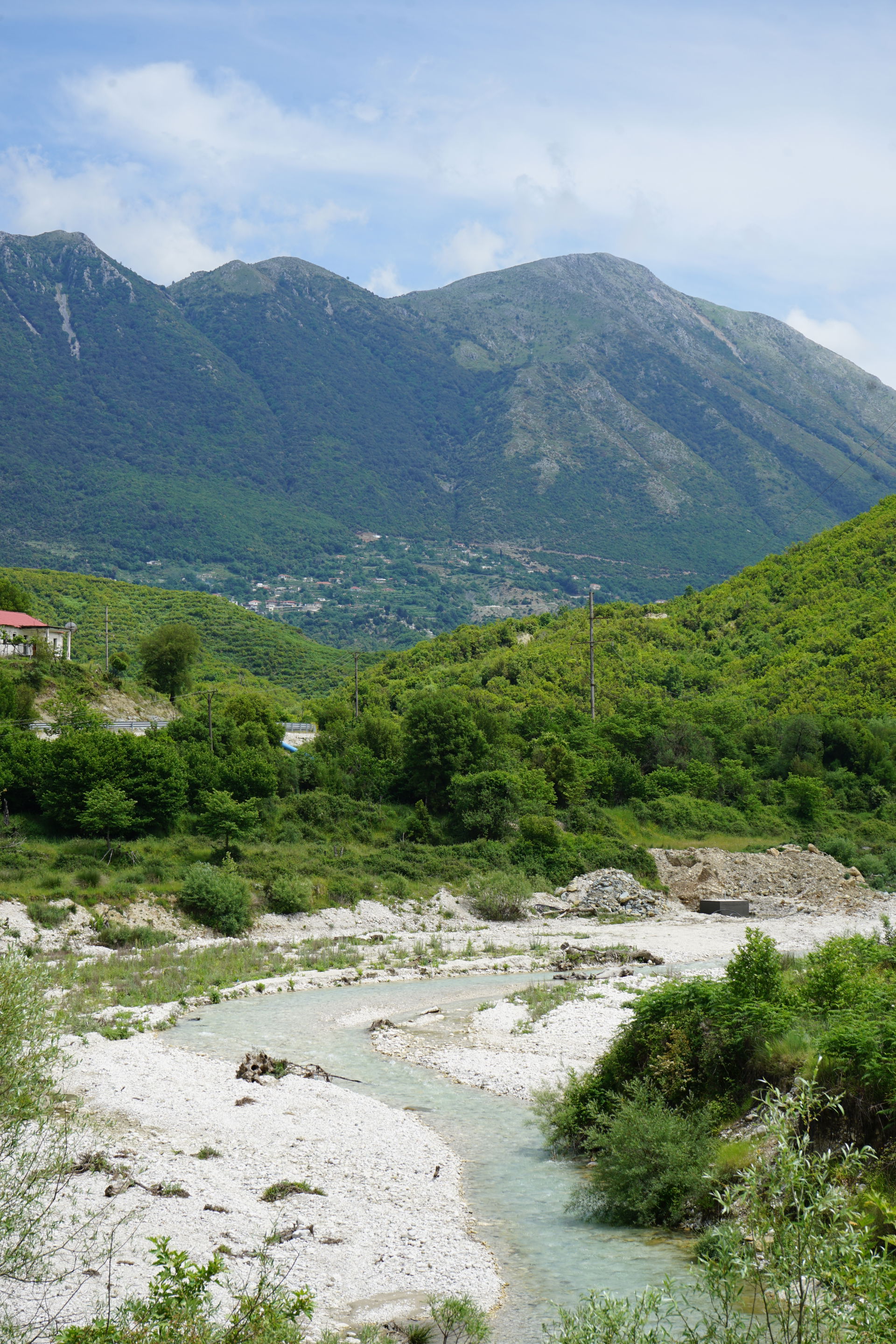 Shushica River and the village of Kuç in the mountains of South…