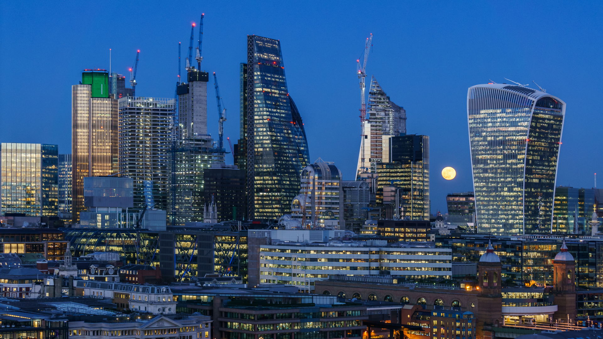 Supermoon over the City of London viewed from Tate Modern.